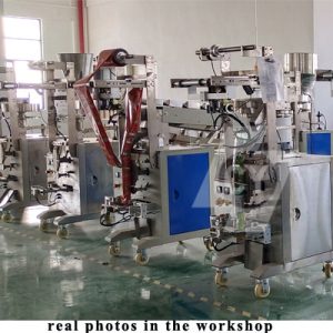 Machine à emballer les aliments soufflés / arachides / granules de graines / Machine d'emballage automatique multi-matériaux avec tasses volumétriques et chaîne de seau